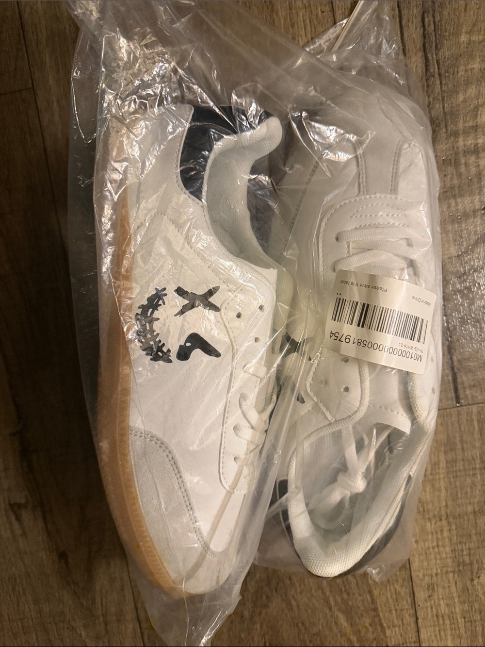 White Low-Top Men's Sneakers with Gum Sole and Black Graphic Accents